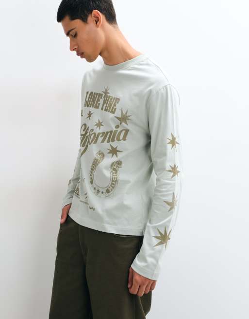 ASOS DESIGN T-shirt ampia rilassata a maniche lunghe con grafica verde chiaro, 2 di 5