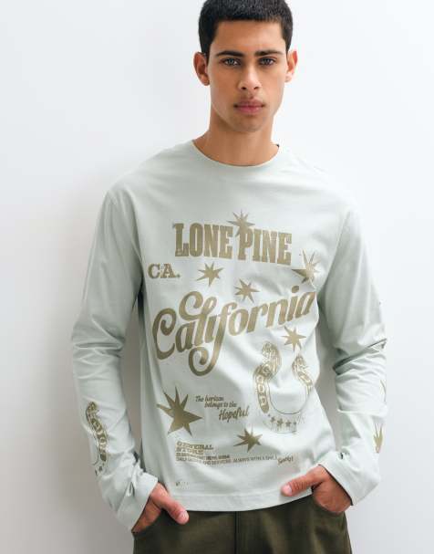 ASOS DESIGN t-shirt ample décontracté à manches longues avec motif graphique vert clair - view 1