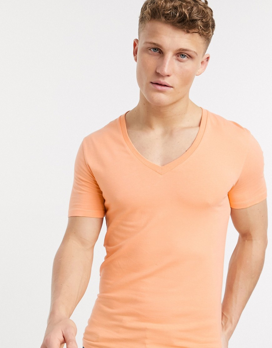 ASOS DESIGN - T-shirt attillata corallo con scollo a V-Arancione