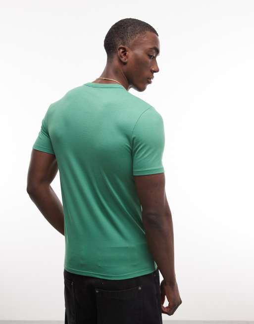 ASOS DESIGN - T-shirt attillata verde con grafica calcistica "Brazil", 5 di 5