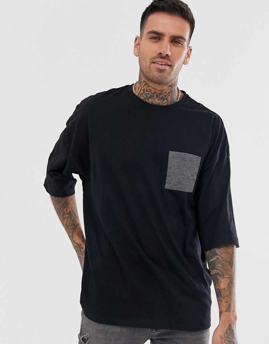 ASOS DESIGN - T-shirt biologica oversize nera con tasca a contrasto-Nero