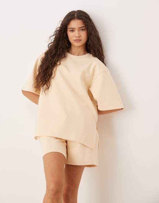 ASOS DESIGN - T-shirt color latticello in tessuto interlock con spacco laterale in coordinato
