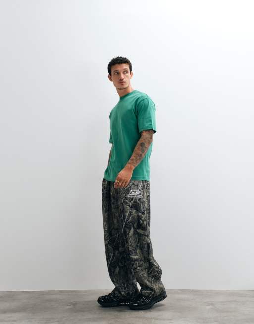 ASOS DESIGN - T-shirt comoda verde con grafica "Paraiso" a bolle, 5 di 5