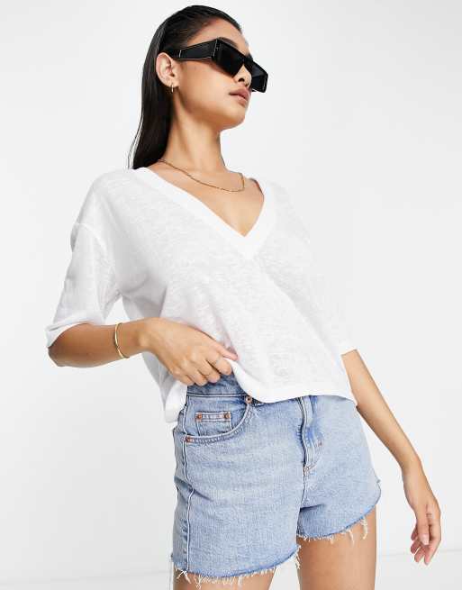 ASOS DESIGN - T-shirt con scollo a V testurizzata, colore bianco 