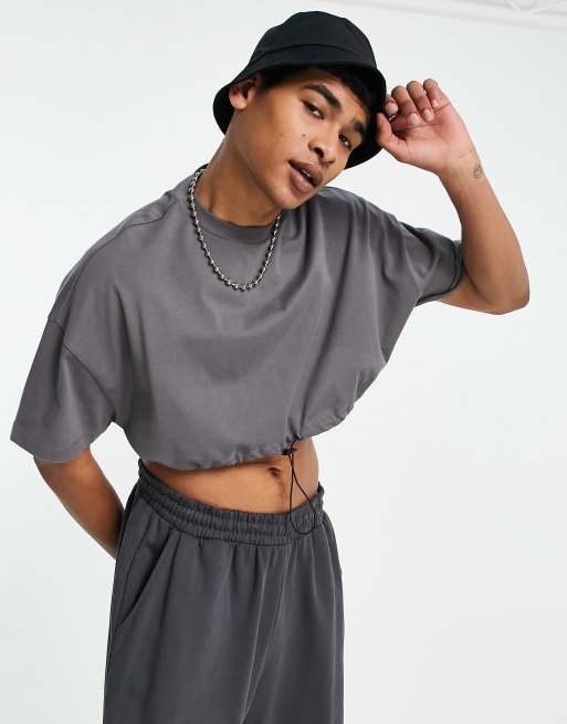 ASOS DESIGN - T-shirt corta oversize con fermacorda in vita in tessuto pesante nero slavato