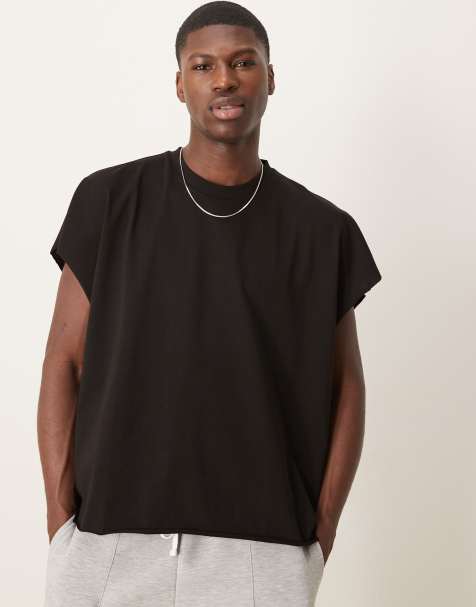 ASOS DESIGN - T-shirt corta senza maniche pesante oversize nera con bordi grezzi - view 1