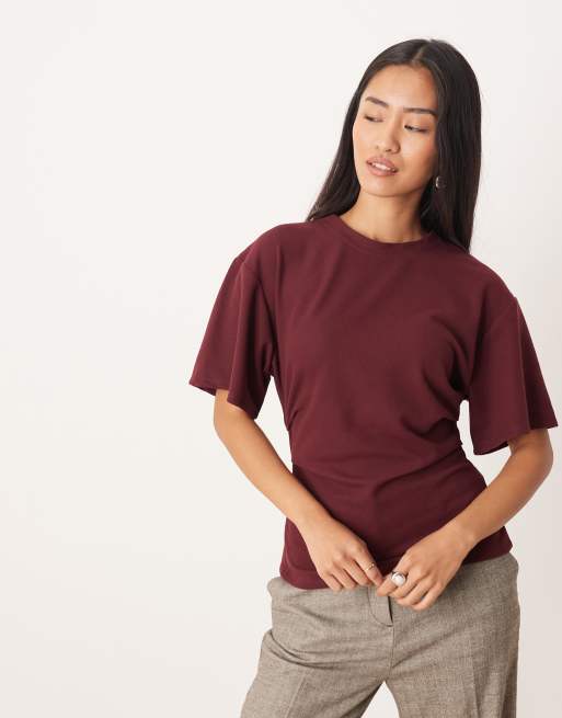 ASOS DESIGN - T-shirt en tissu gaufré brossé à taille corsetée - Bordeaux