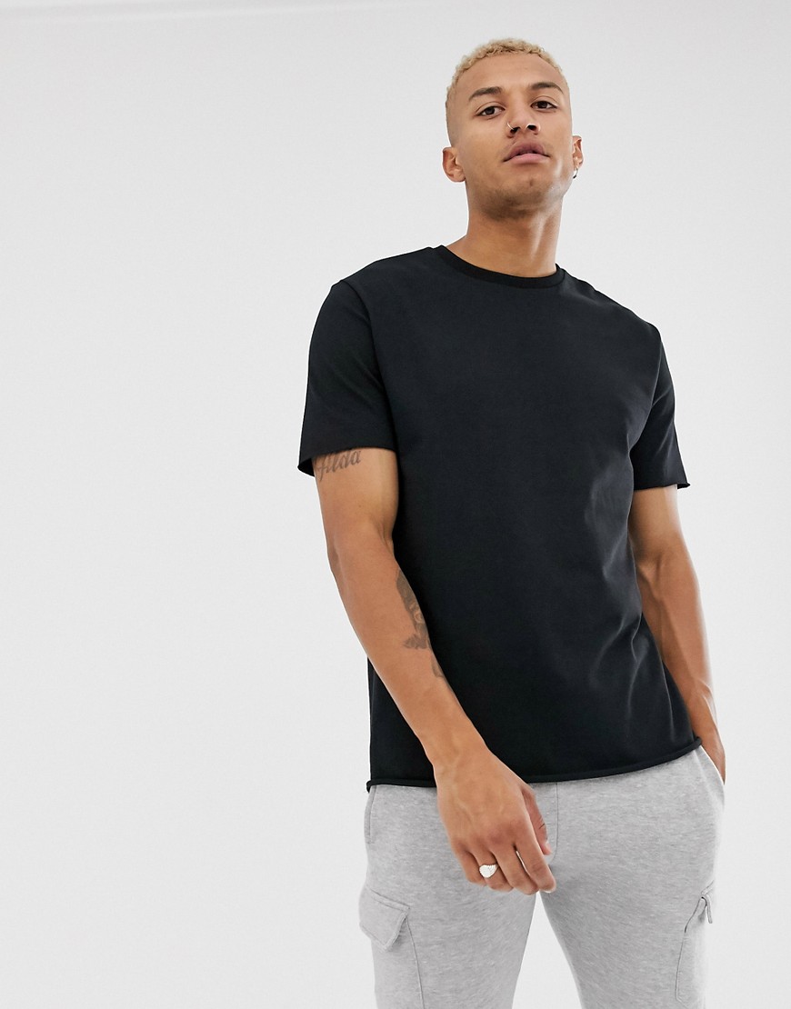 ASOS DESIGN - T-shirt girocollo comoda in pesante tessuto organico nero con bordi grezzi
