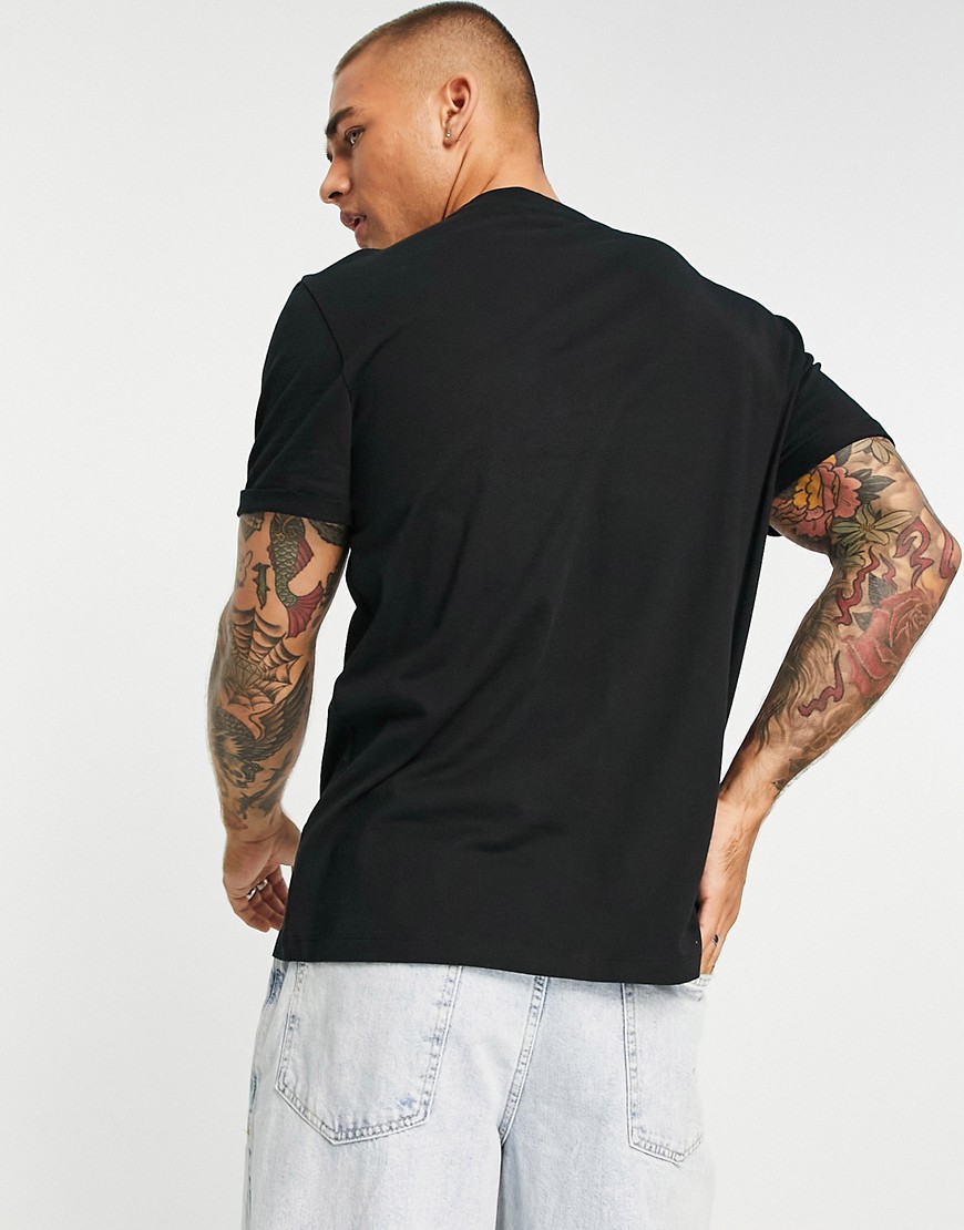 T-shirt girocollo nera con maniche con risvolto-Nero - ASOS DESIGN T-shirt donna  - immagine3