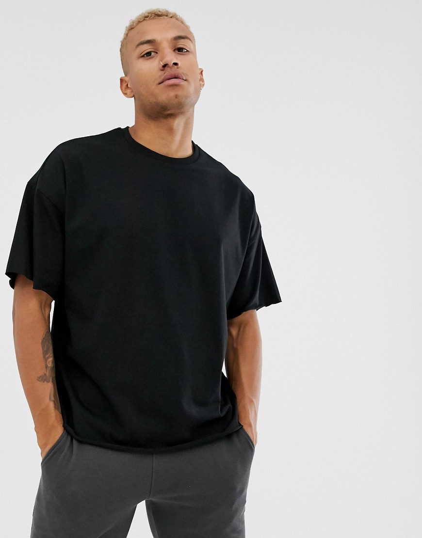 ASOS DESIGN - T-shirt girocollo oversize in cotone organico pesante con bordi grezzi nera-Nero