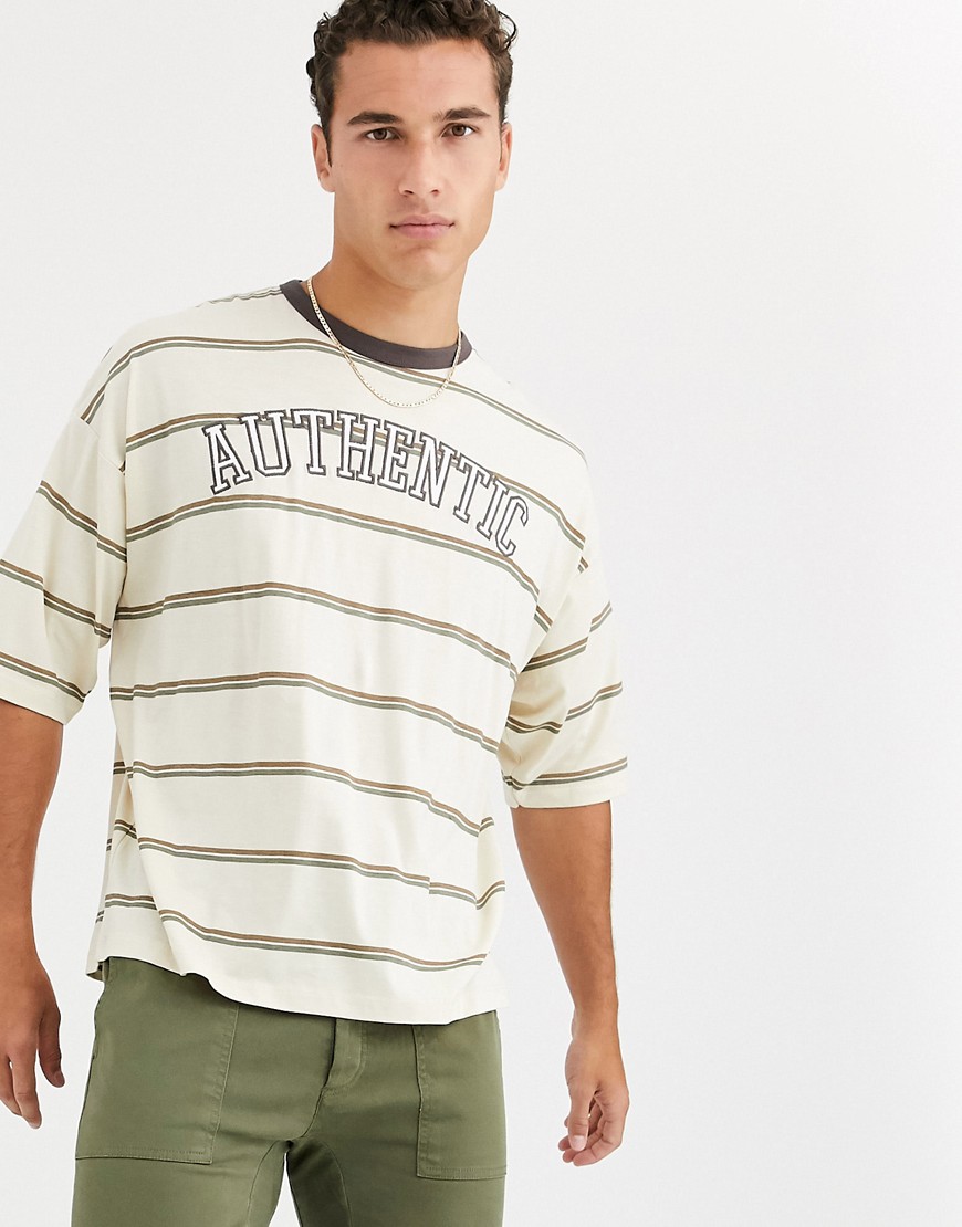 ASOS DESIGN – T-shirt i ekologisk bomull med oversize-passform, förstärkt ringning och broderad text på bröstet-Beige