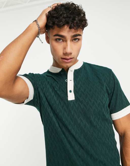 ASOS DESIGN - T-shirt in groen met textuur en contrasterende hals en manchetten