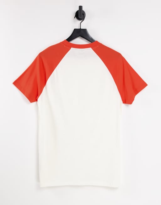 White t shirt store with red sleeves