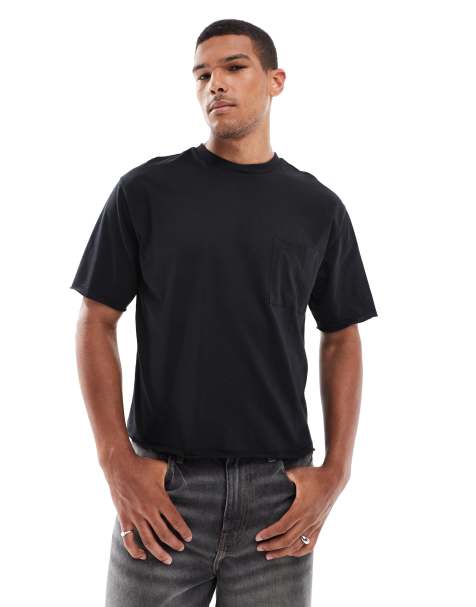 ASOS DESIGN – T-Shirt in Schwarz mit lockerem, kastigem Schnitt und ungesäumter Brusttasche - view 1