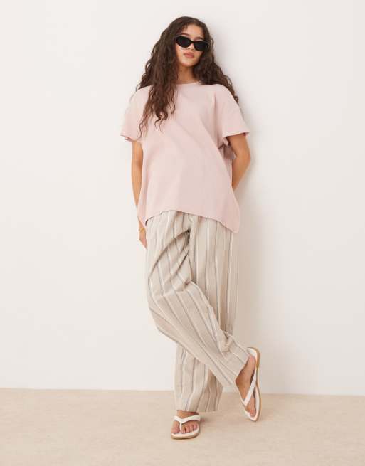 ASOS DESIGN - T-shirt in tessuto a nido d'ape color rosa slavato con orlo super oversize