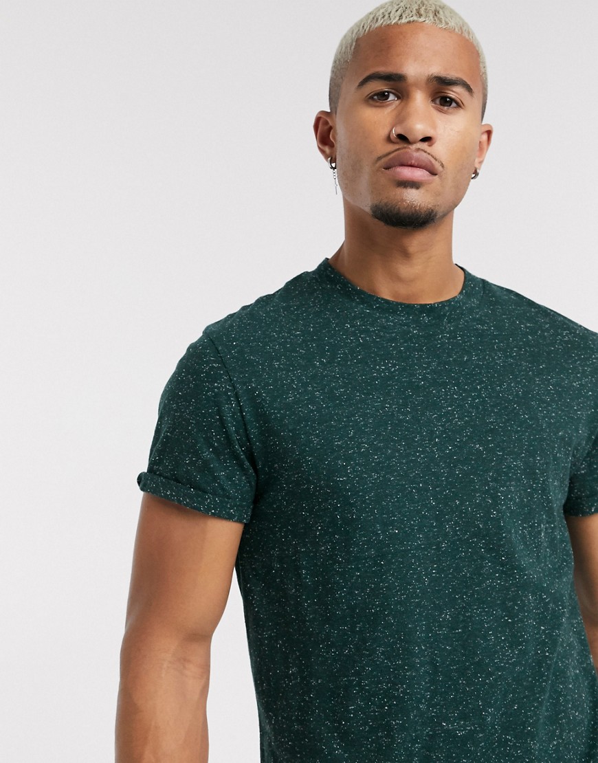 ASOS DESIGN - T-shirt in tessuto verde puntinato con collo alto
