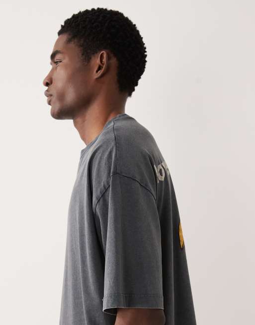 ASOS DESIGN – T-Shirt in verwaschenem Schwarz mit „Guinness“-Print in Oversize-Passform, 4 von 5