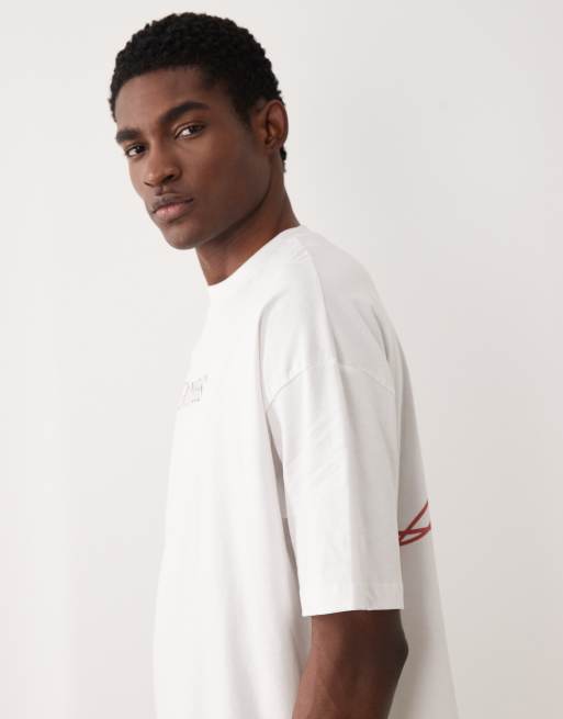 ASOS DESIGN – T-Shirt in Weiß mit „Guinness“-Print in Oversize-Passform, 4 von 5