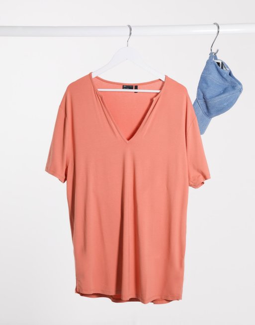 ASOS DESIGN - T-shirt long décontracté en viscose avec col V profond - Rouge brique