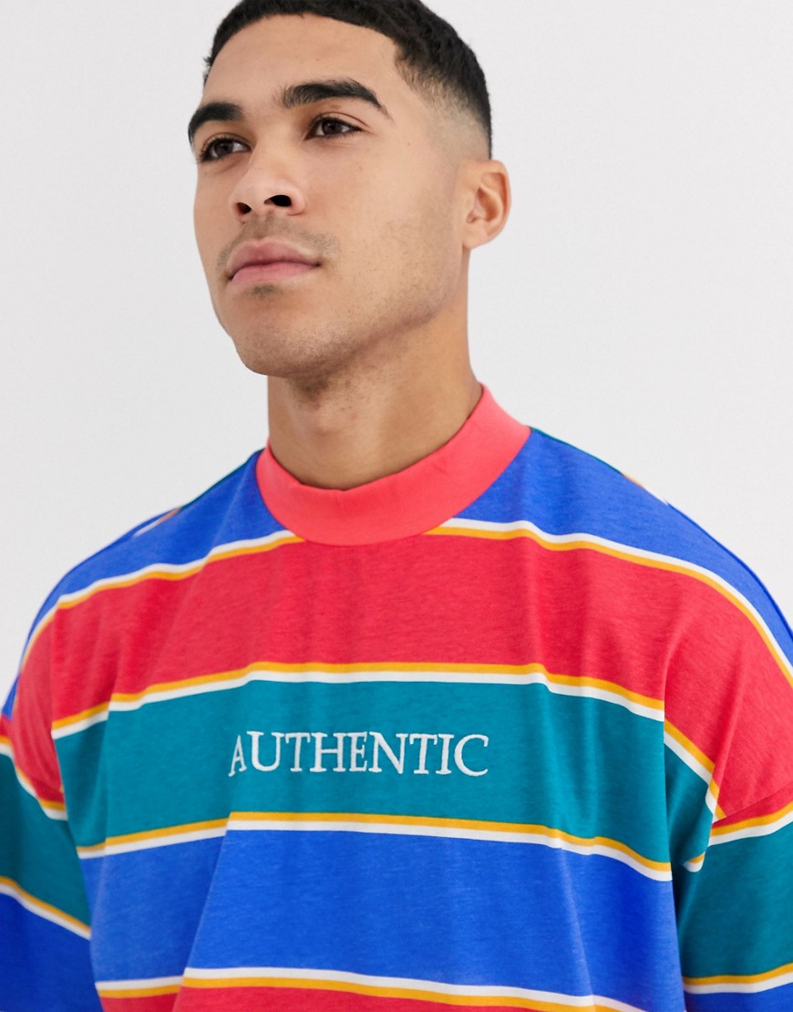 ASOS DESIGN - T-shirt lunga oversize a righe con collo alto e spacchi laterali-Multicolore