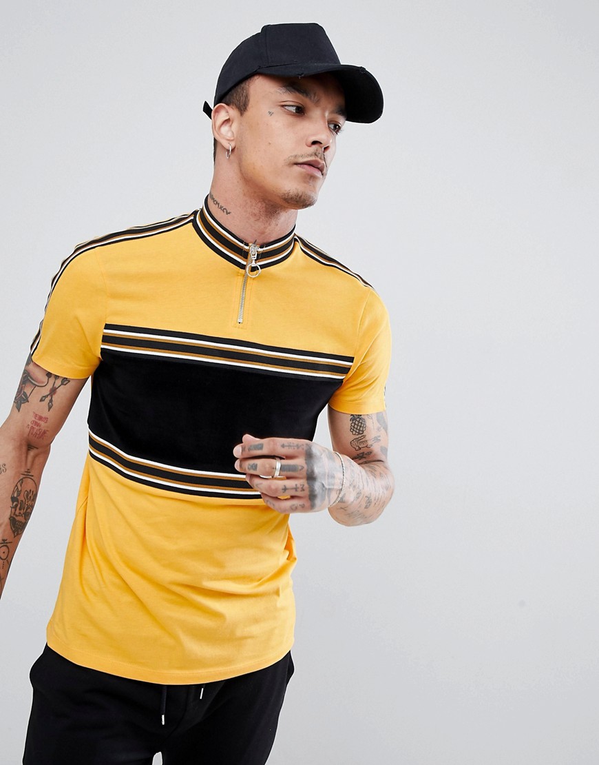 ASOS DESIGN - T-shirt met contrasterend inzet van fluweel en gele biezen-Geel