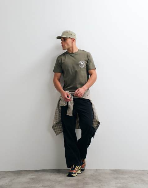 ASOS DESIGN - T-shirt met palmboomprint op de borst in olijfgroen - view 1