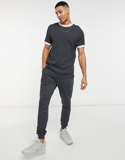ASOS DESIGN - T-shirt met wafelpatroon en contrasterende biezen in gewassen zwart