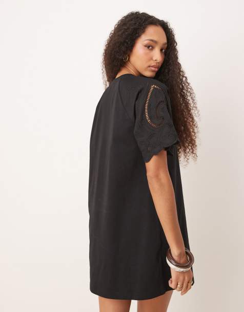 ASOS DESIGN – T-Shirt-Minikleid in Schwarz mit Häkelspitze an den Ärmeln - view 1