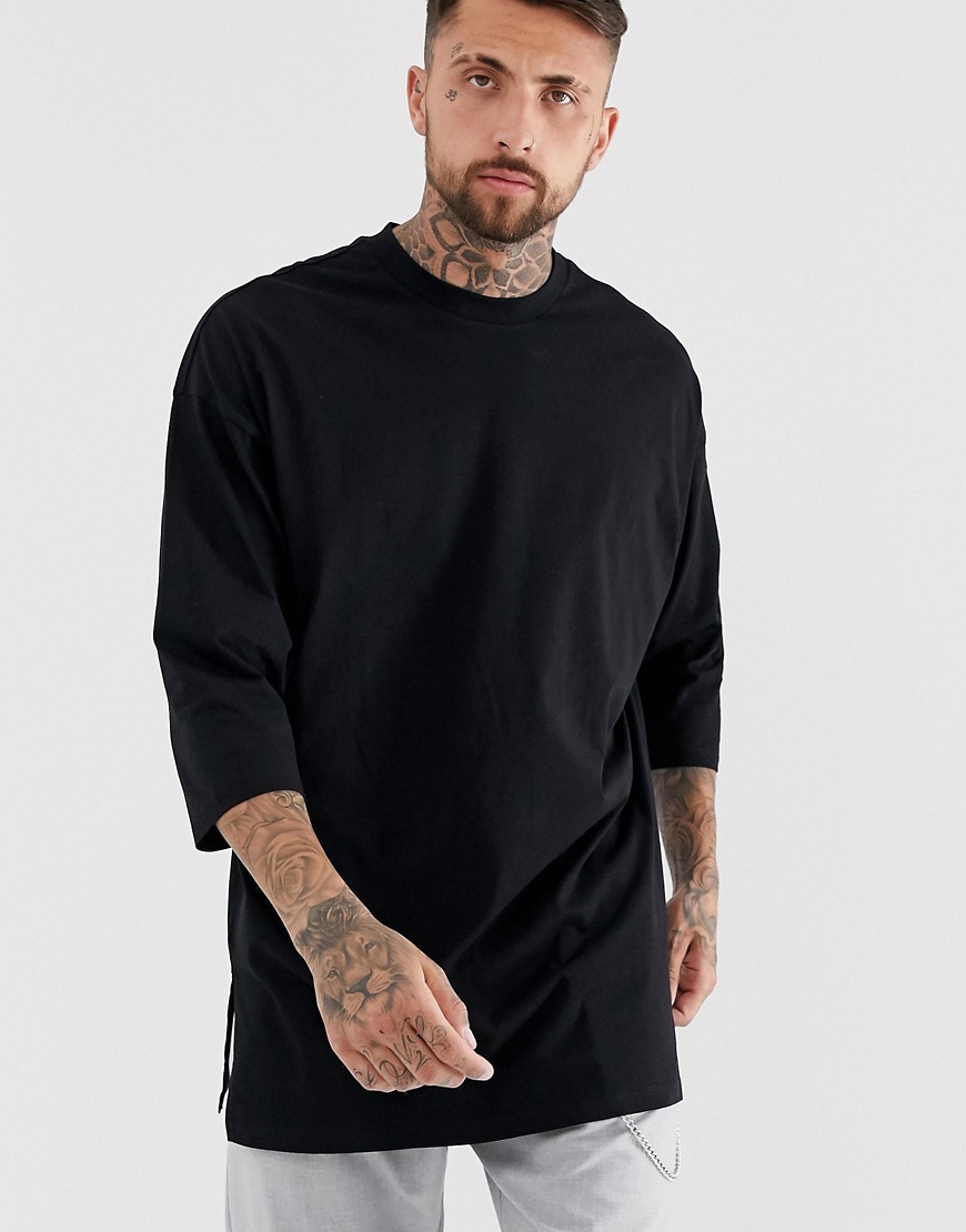 ASOS DESIGN - T-shirt molto lunga oversize con maniche a 3/4 nera-Nero