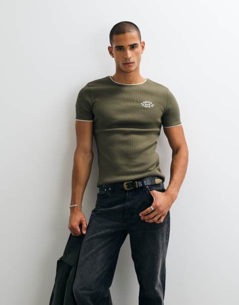 ASOS DESIGN t-shirt muscle ringer super pesante con grafica sul petto in costina verde oliva - view 1