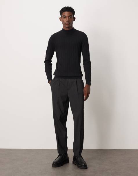 ASOS DESIGN - T-shirt nera attillata a maniche lunghe in maglia a coste con collo alto - view 1