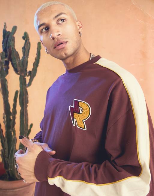 ASOS DESIGN - T-shirt oversize a maniche lunghe bordeaux color block con scritta stile college, 1 di 4