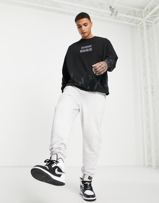 ASOS DESIGN - T-shirt oversize a maniche lunghe con scritta 