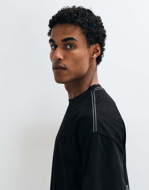 ASOS DESIGN t-shirt oversize a maniche lunghe con stampa celestiale della colonna vertebrale nera, 5 di 5
