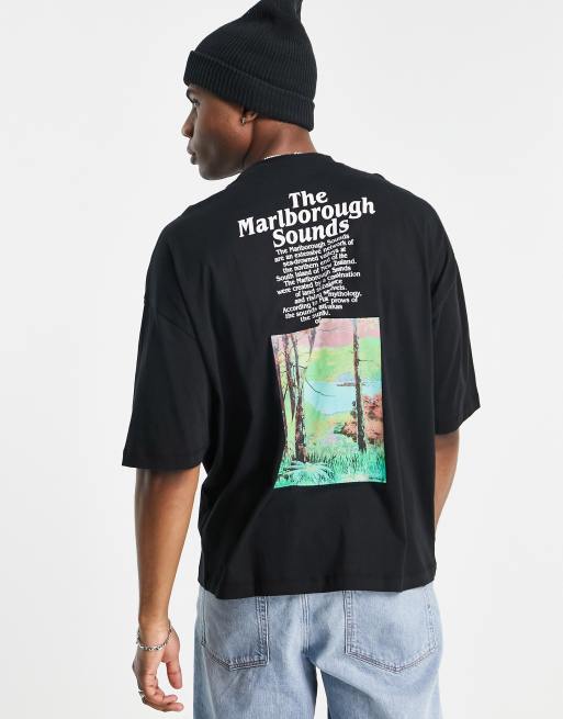 ASOS DESIGN - T-shirt oversize avec imprimé photo floral sur la poitrine et au dos - Noir