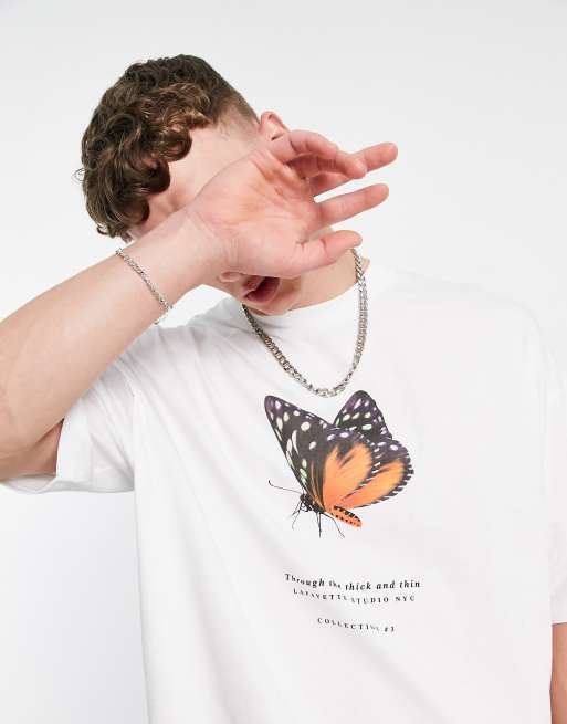 ASOS DESIGN - T-shirt oversize avec inscription et papillon imprimés sur le devant - Blanc