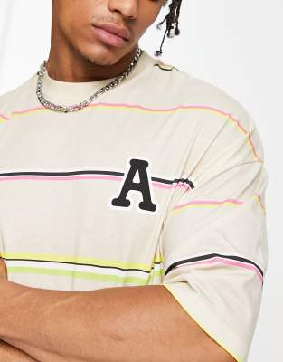 T-shirt oversize beige a righe con stampa sul petto-Neutro - ASOS DESIGN T-shirt donna  - immagine1