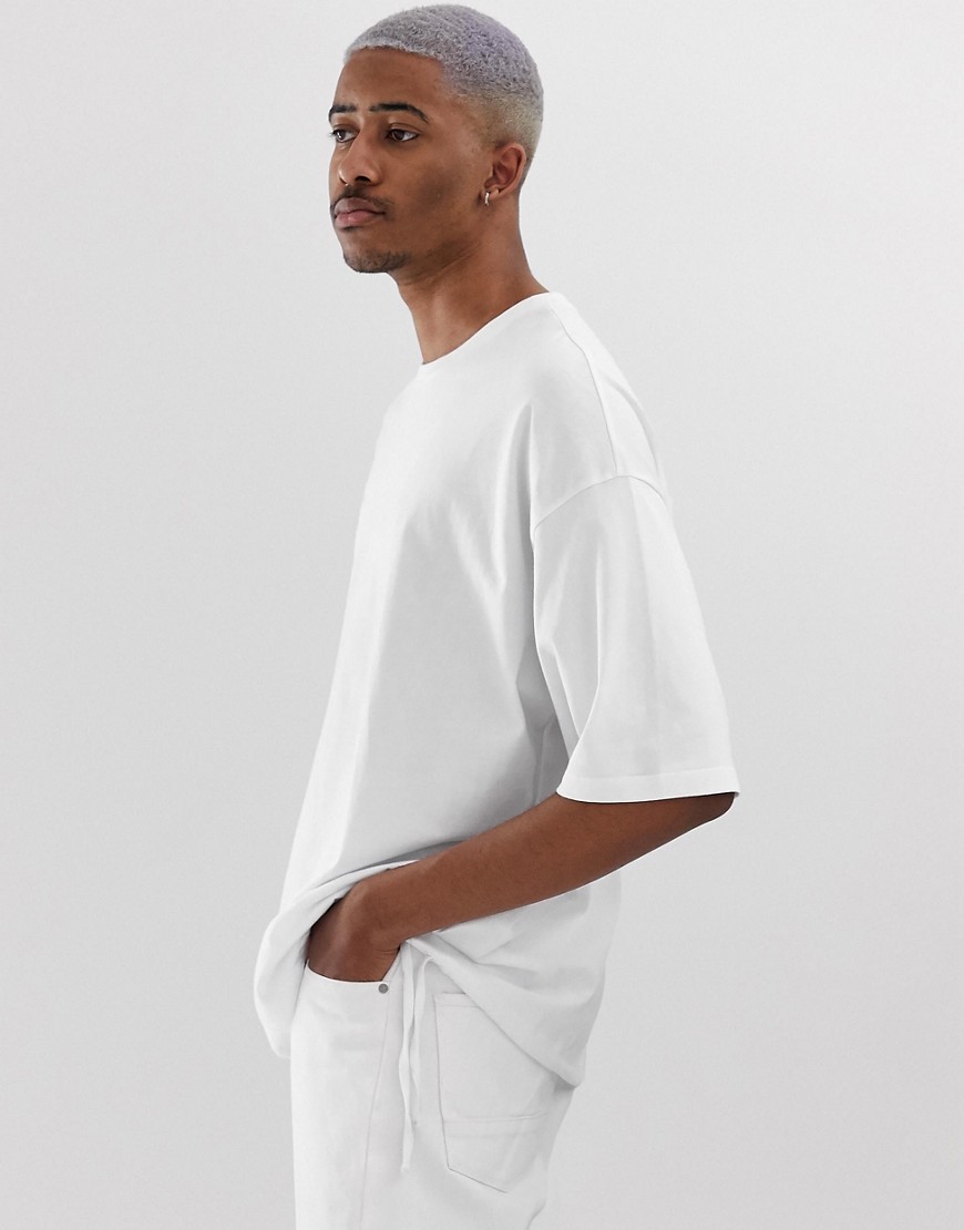 ASOS DESIGN - T-shirt oversize bianca con coulisse sul fondo-Bianco