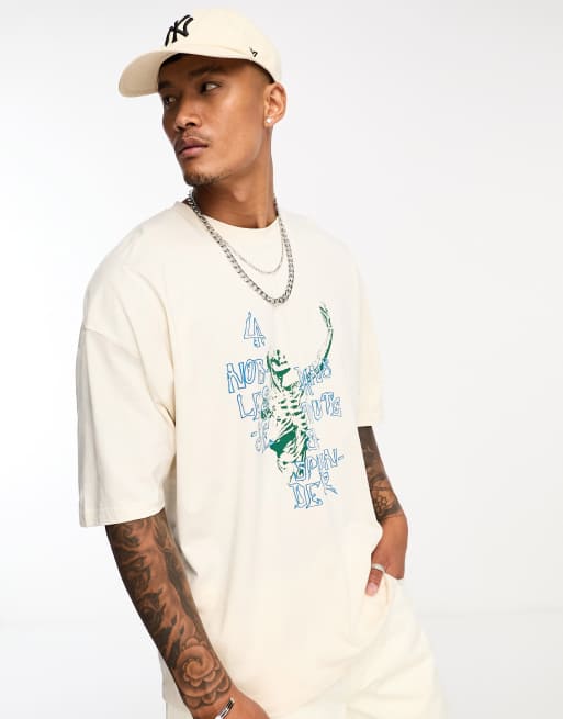 ASOS DESIGN - T-shirt oversize color écru con stampa effetto disegno stilizzato stile grunge