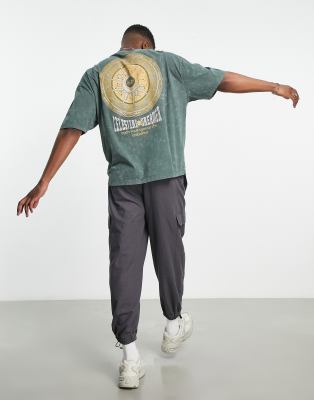 T-shirt oversize color kaki slavato con stampa celestiale sul retro e sul petto-Verde - ASOS DESIGN T-shirt donna  - immagine1