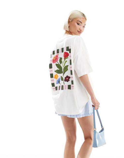 ASOS DESIGN - T-shirt oversize color panna con stampa di fiori e cornice a righe