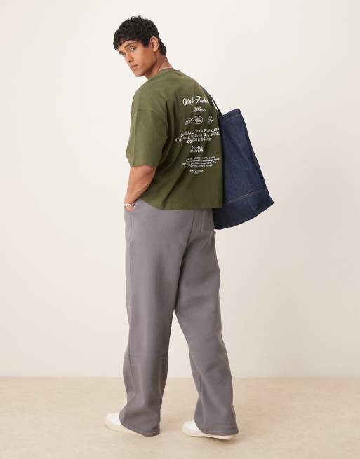 ASOS DESIGN - T-shirt oversize color verde scuro con spalle scese e stampa