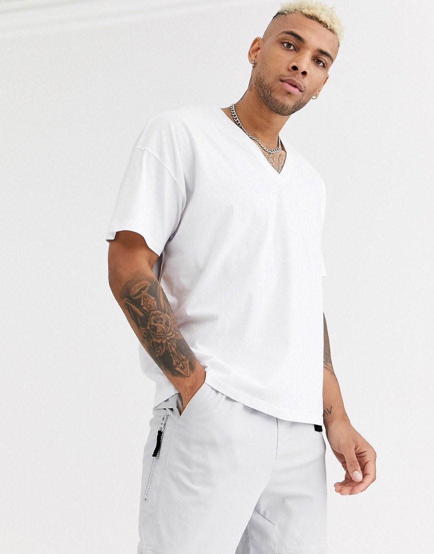 ASOS DESIGN - T-shirt oversize con profondo scollo a V bianca-Bianco