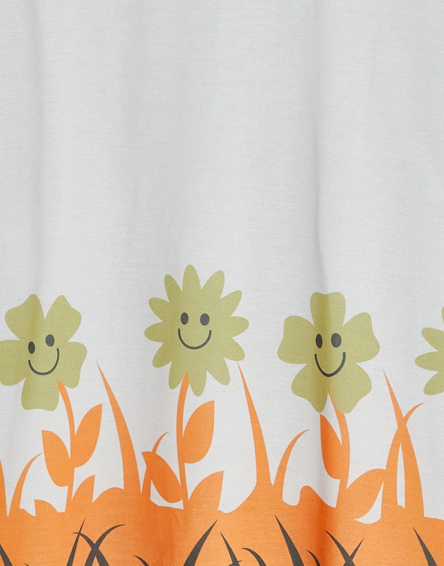 T-shirt oversize con stampa a fiori sul fondo-Multicolore - ASOS DESIGN T-shirt donna  - immagine1
