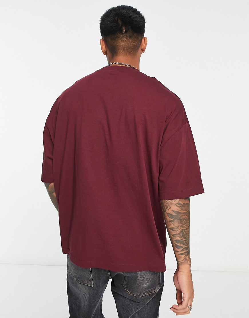 T-shirt oversize con stampa con scrittaNew Yorksul petto, colore bordeaux-Rosso - ASOS DESIGN T-shirt donna  - immagine1