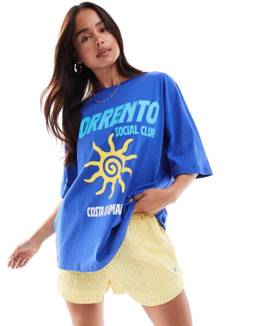 ASOS DESIGN - T-shirt oversize con stampa grafica con sole di Sorrento, colore Blu