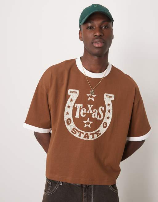 ASOS DESIGN - T-shirt oversize corta marrone con grafica stile western e bordi a contrasto
