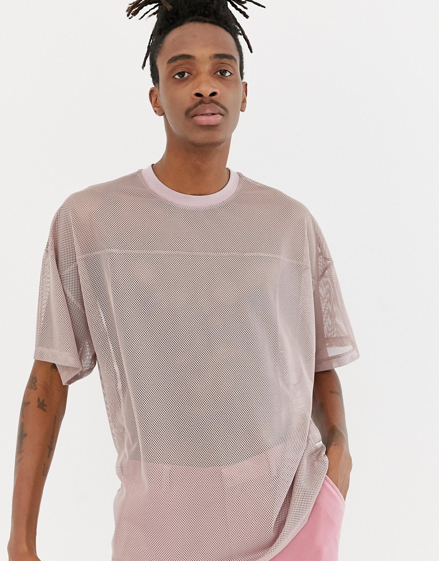 ASOS DESIGN - T-shirt oversize in tessuto a rete con cucitura sul carré rosa