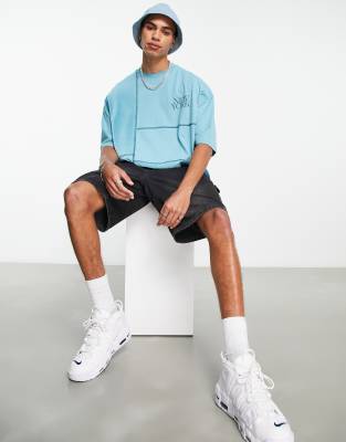 T-shirt oversize in velour blu a coste color block - ASOS DESIGN T-shirt donna  - immagine1