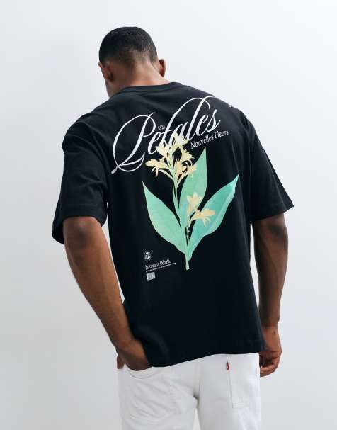 ASOS DESIGN - T-shirt oversize nera con grafica floreale ricamata - view 1